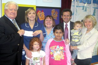 Pinderfields paediatric unit Christmas party cheque presentation